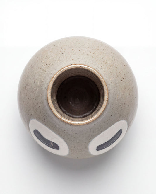 Ivory grey ceramic bud vase with two closed eyes, handmade in Korea, detail 2