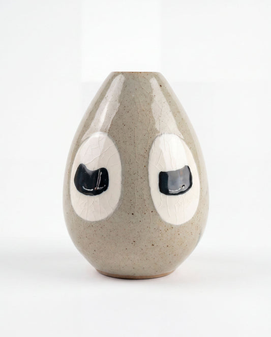 Ivory grey ceramic bud vase with two closed eyes, handmade in Korea