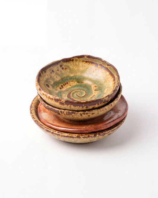 Set of four Korean ceramic saucers with green and brown spiral, Dosan workshop