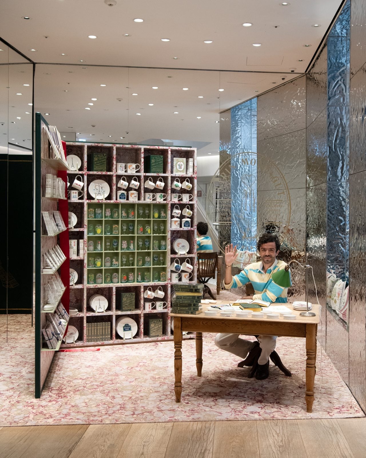 Marin Montagut pop-up in Seoul, with a desk in front of mirrored walls